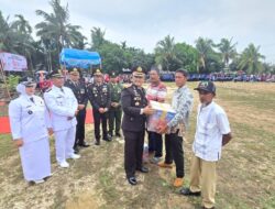 Dirpamobvit Polda Riau Pimpin Upacara HUT RI ke-81 di Kempas Berlangsung Khidmat, Diwarnai Penghargaan dan Penyaluran Bantuan